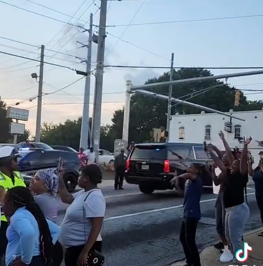 Trump's Caravan Greeted By Atlanta Residents Along His Trip Through The City