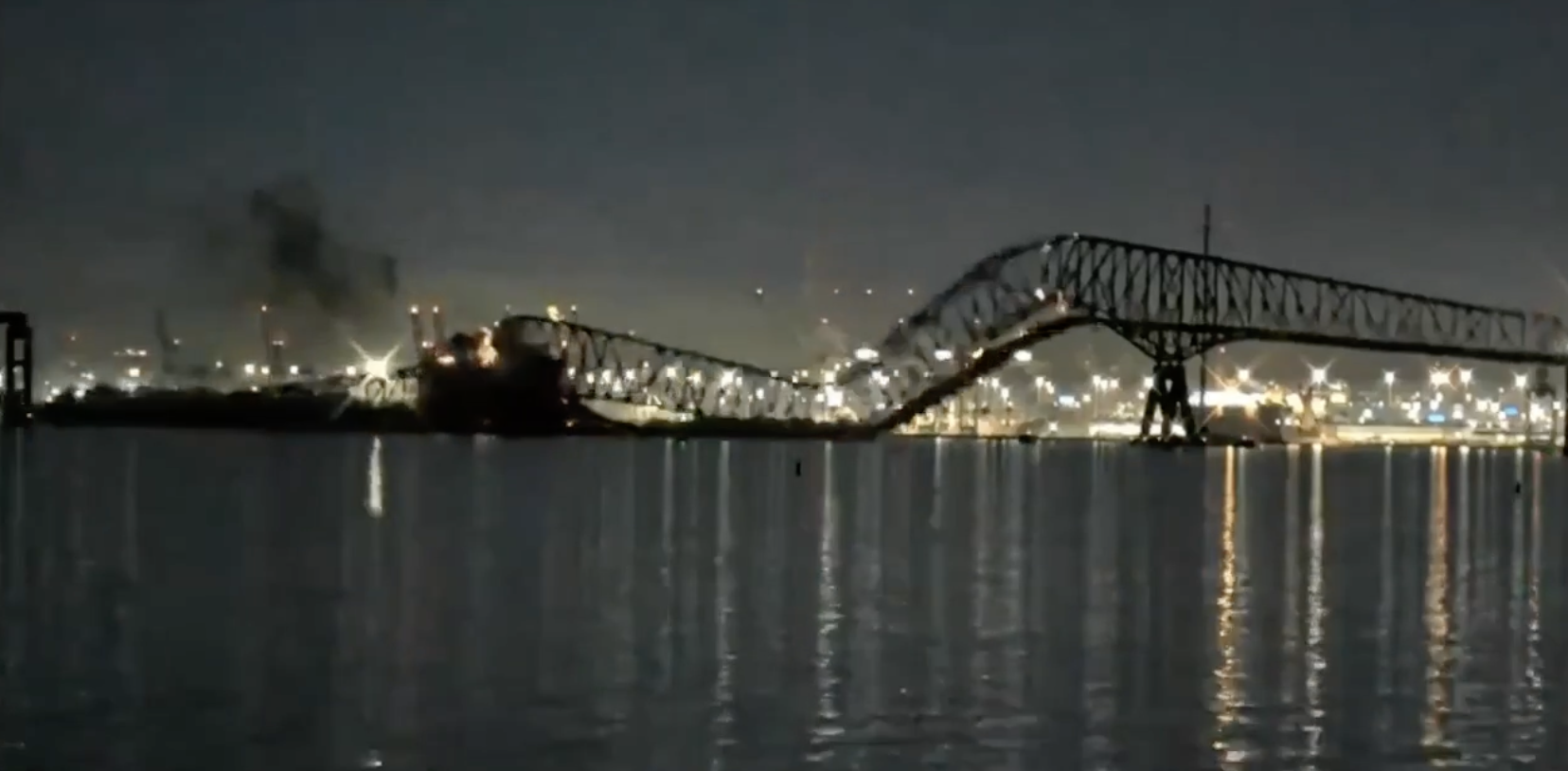 Cargo Ship Hits Baltimore Bridge Sending Vehicles Into River As It Collapses